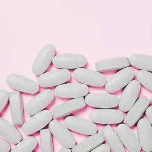 Pills on a pink back ground